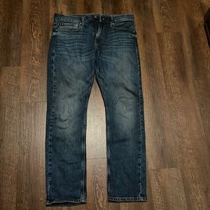 Medium wash Calvin Klein jeans.